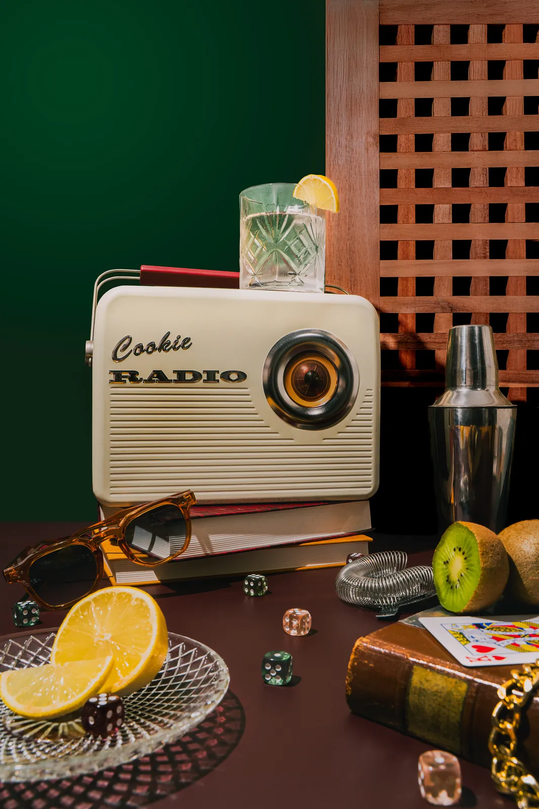 A Cookie radio with lemons and a cocktail shaker
