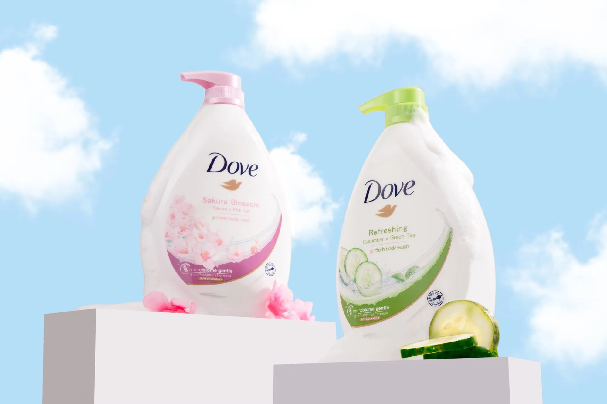 Two Dove body wash bottles on plinths in the clouds