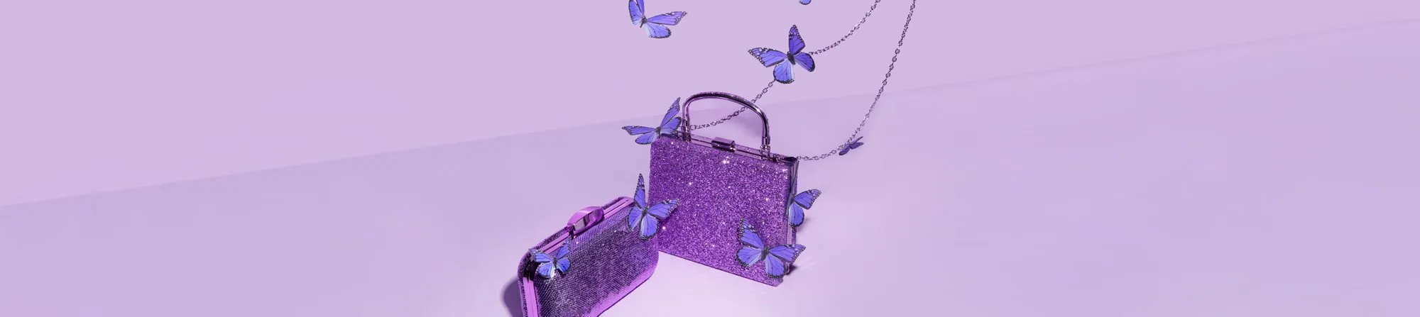 Glitter purple handbags with butterflies on lilac